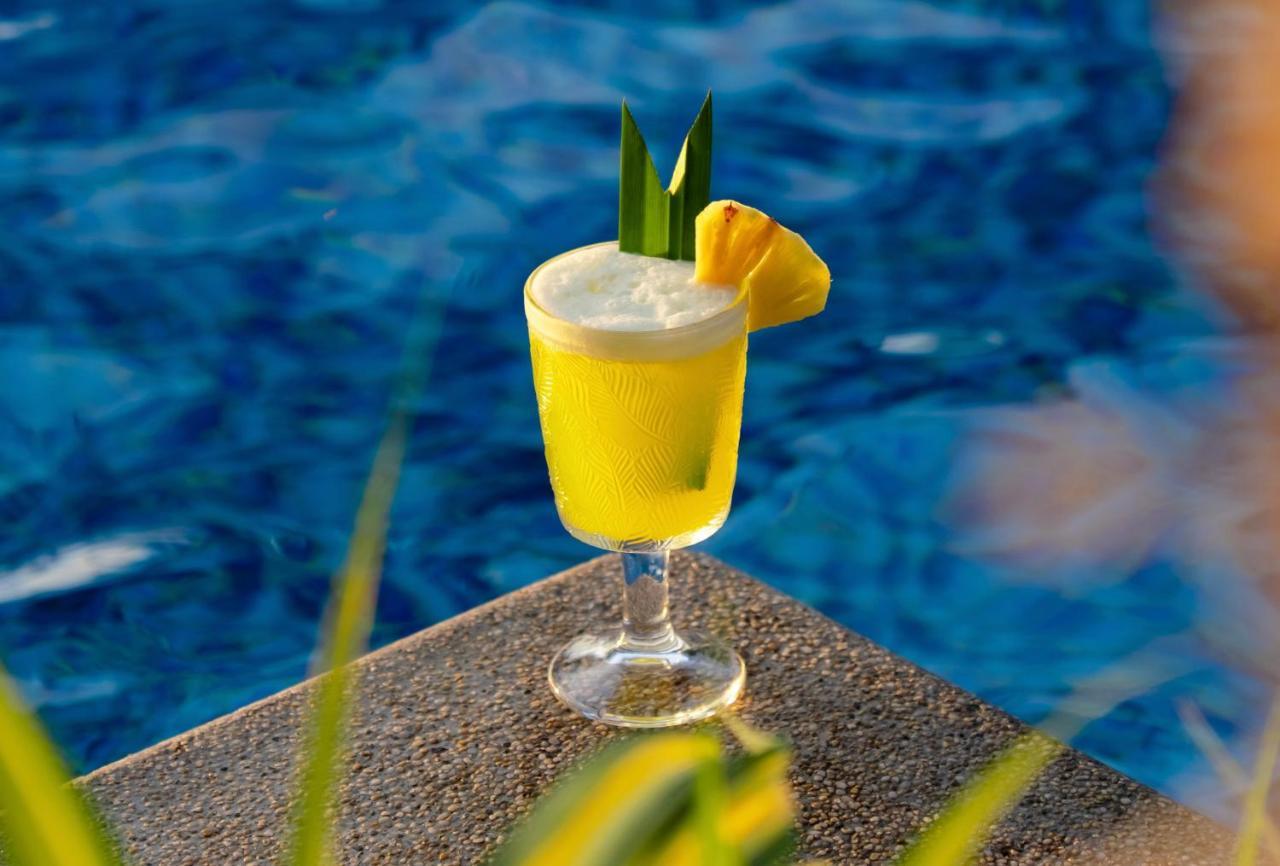 Salinda Resort Phu Quoc - Sparkling Wine Breakfast Exterior photo A pineapple juice drink